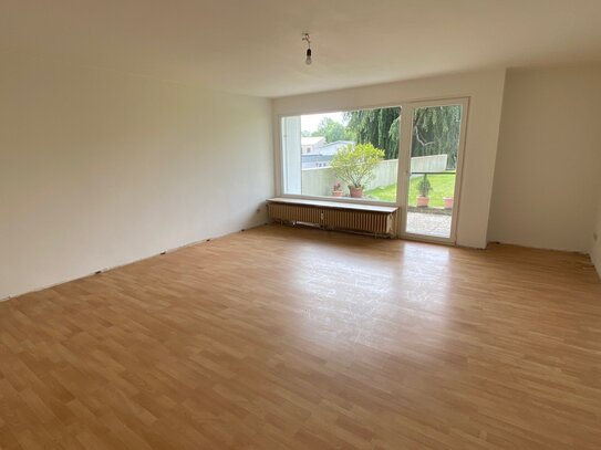 Attraktive 3-Zimmer-Wohnung (teilweise renoviert) mit Terrasse und Tiefgaragenstellplatz