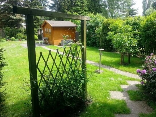 Vermietete Dachgeschosswohnung mit eigenem Garten , Balkon und Garage