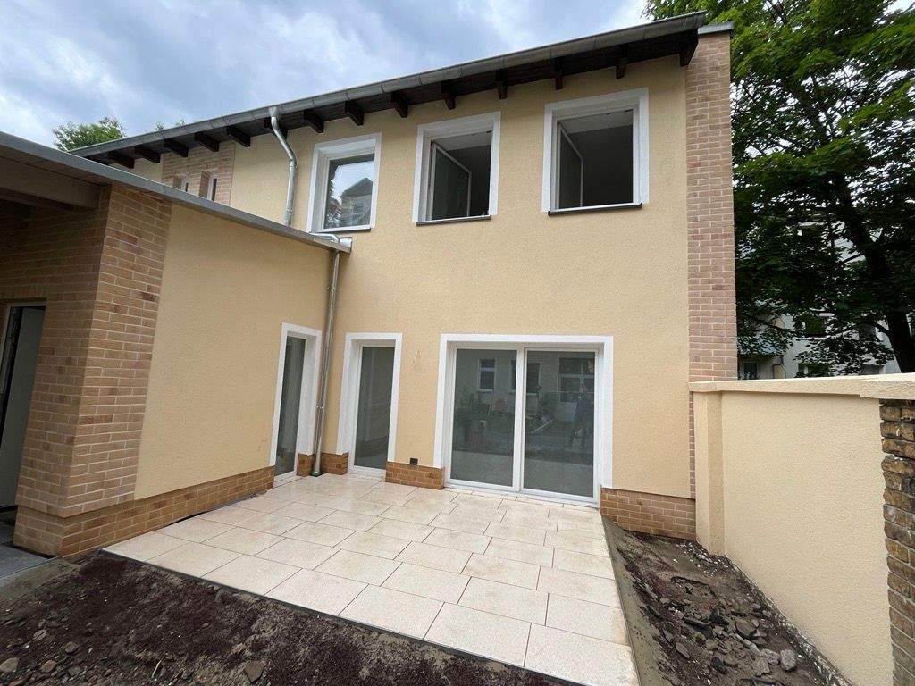 Erstbezug! Wunderschöne 3-Zimmer Doppelhaushälfte mit Terrasse und Garten. - Foto 1