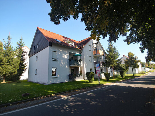 Dreiraumwohnung im 1. Obergeschoss mit Balkon und Tiefgaragenstellplatz