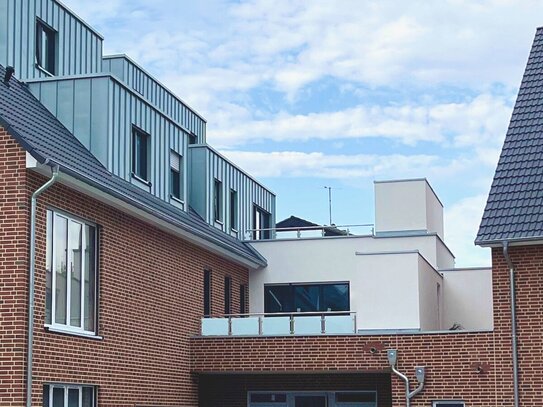 Exklusive Neubauwohnung mit großer Dachterrasse und TG-Stellplatz