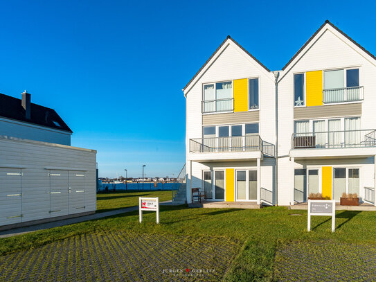 Wohnen über zwei Ebenen direkt am Meer mit Dachterrasse