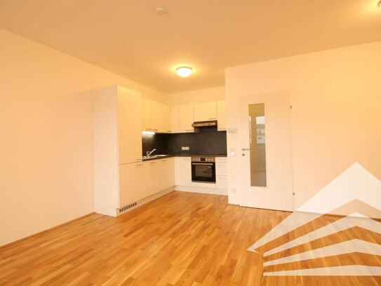 Moderne 2 Zimmerwohnung mit Küche und hofseitigem Balkon - TG verfügbar!