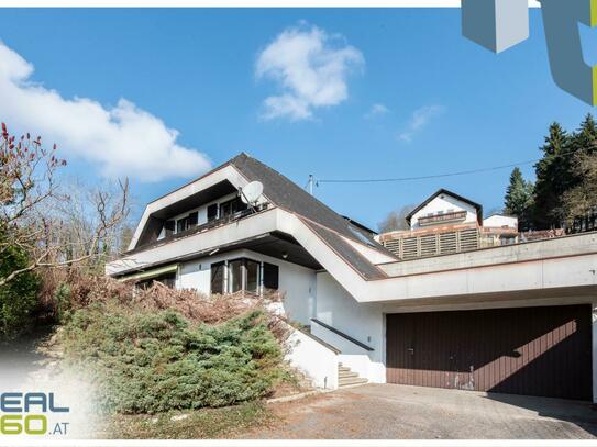 Charmantes Architektenhaus eingebettet im Grünen mit unverbaubarer Aussicht!