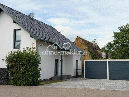 Energieeffizientes, freistehendes Einfamilienhaus mit Garten in ruhiger Lage