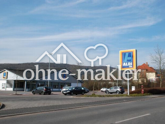 Attraktives 7.000 m² Einkaufszentrum mit Wohngebäude in Top-Lage neben Aldi