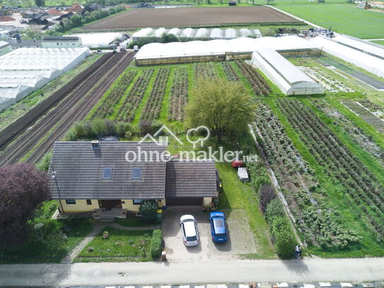 Grünes Paradies: Idyllisches Familienhaus mit großem Garten und Potenzial für Einliegerwohnung