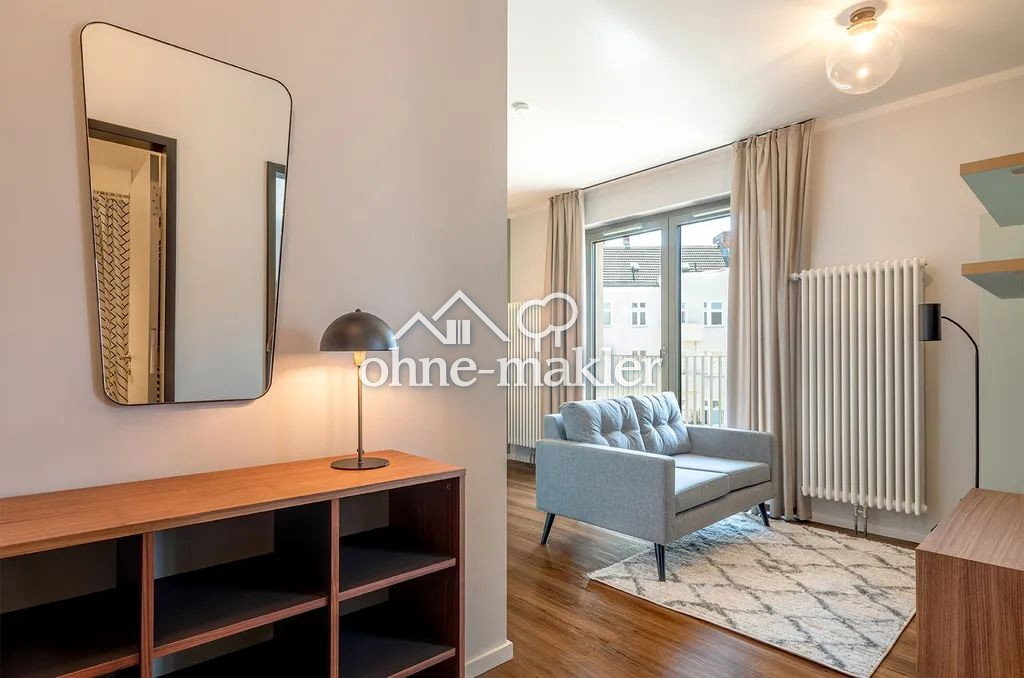 Gemütliche unbefristete 2-Zimmer-Wohnung mit offenem Wohnbereich und Balkon im RIX Neukölln - Foto 1