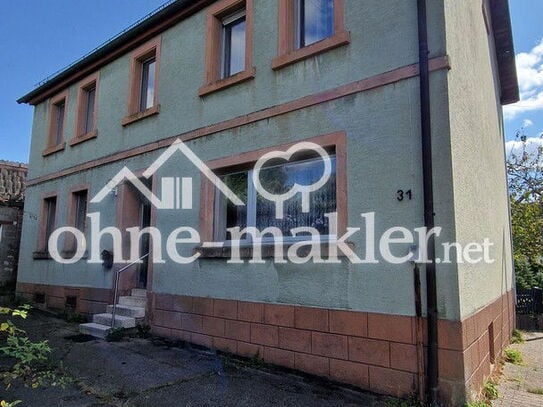 Freistehendes Einfamilienhaus mit Werkstatt, Garage, Garten