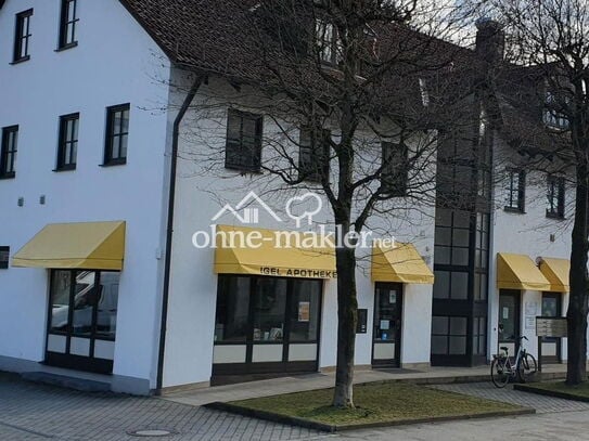 Laden, ehem. IGEL-Apotheke mit Schaufenster, Parkplätzen und Räumen im UG