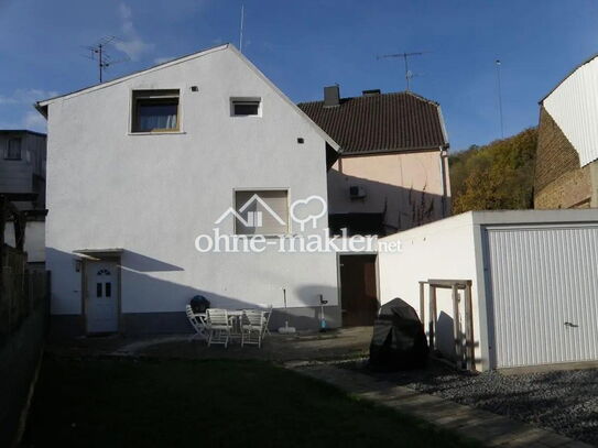 Einfamilienhaus mit Garten und Garage