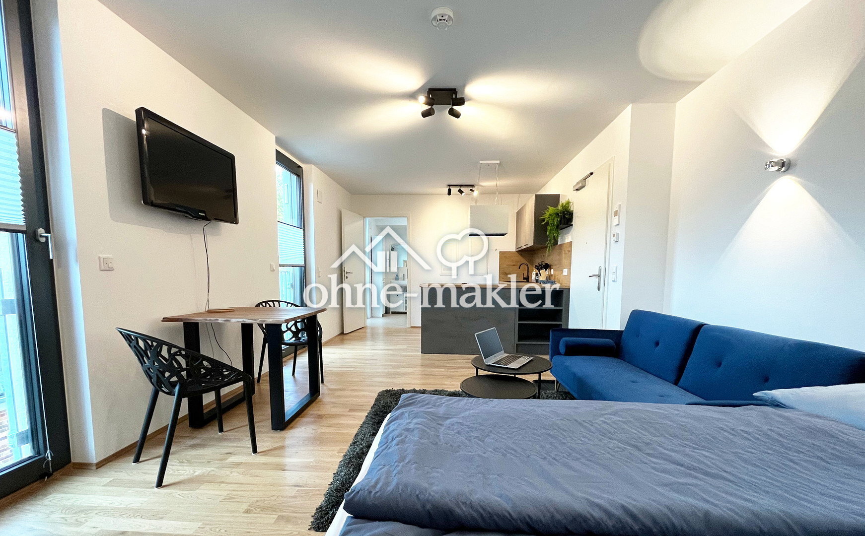 möblierte Neubauwohnung in zentraler Lage - Foto 1