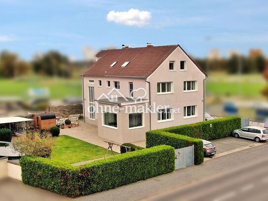 Großzügiges Mehrfamilienhaus mit Garten, Pool und Sommerküche in besonderer Lage