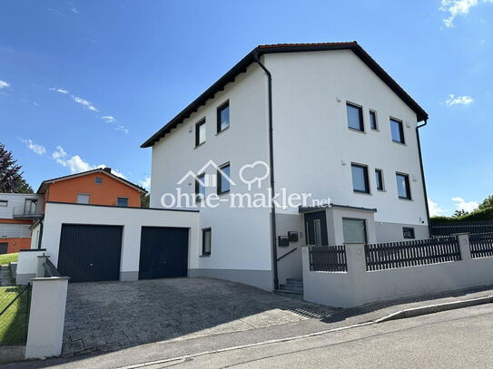 Erstbezug nach Kernsanierung – Moderne 3-Zimmer-Wohnung mit Garage, Balkon und tollem Ausblick