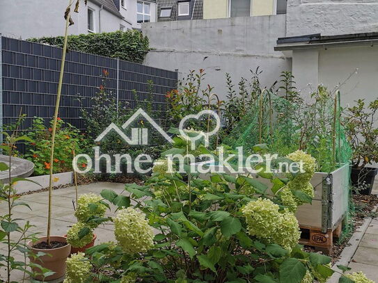 Helle 2 Zimmer Wohnung mit eigenem kleinen Garten und Einbauküche, zentrumsnah