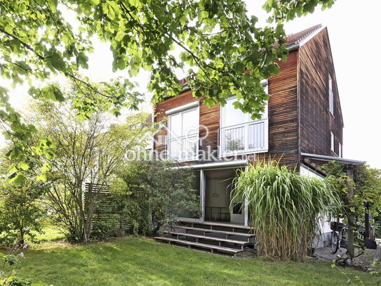 Stil, Licht und Natur - Architekten-Haus mit romantischem Garten in TOPLAGE von privat