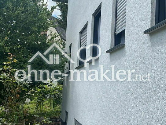 Modernes Mehrfamilienhaus in Heuchelheim mit Büro/ Gewerbeeinheit