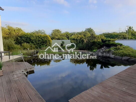 Exklusives Traumhaus mit Schwimmteich in ruhiger Feldrandlage, aber dennoch stadtnah