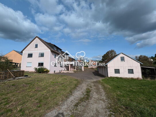 Freistehendes Mehrfamilienhaus in Ortschaftsrandlage