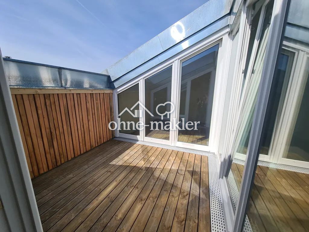 Sanierte Wohnung mit traumhaftem Blick von der Dachterrasse! - Foto 1
