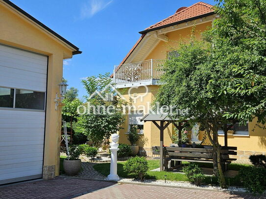 1-2 Familienhaus in Idyllischer Lage mit Gewerbehalle mit großen Garten am Altmain